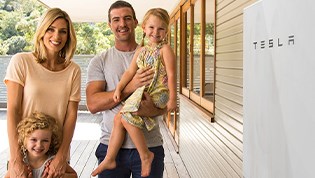 Happy family with Tesla Powerwall 2